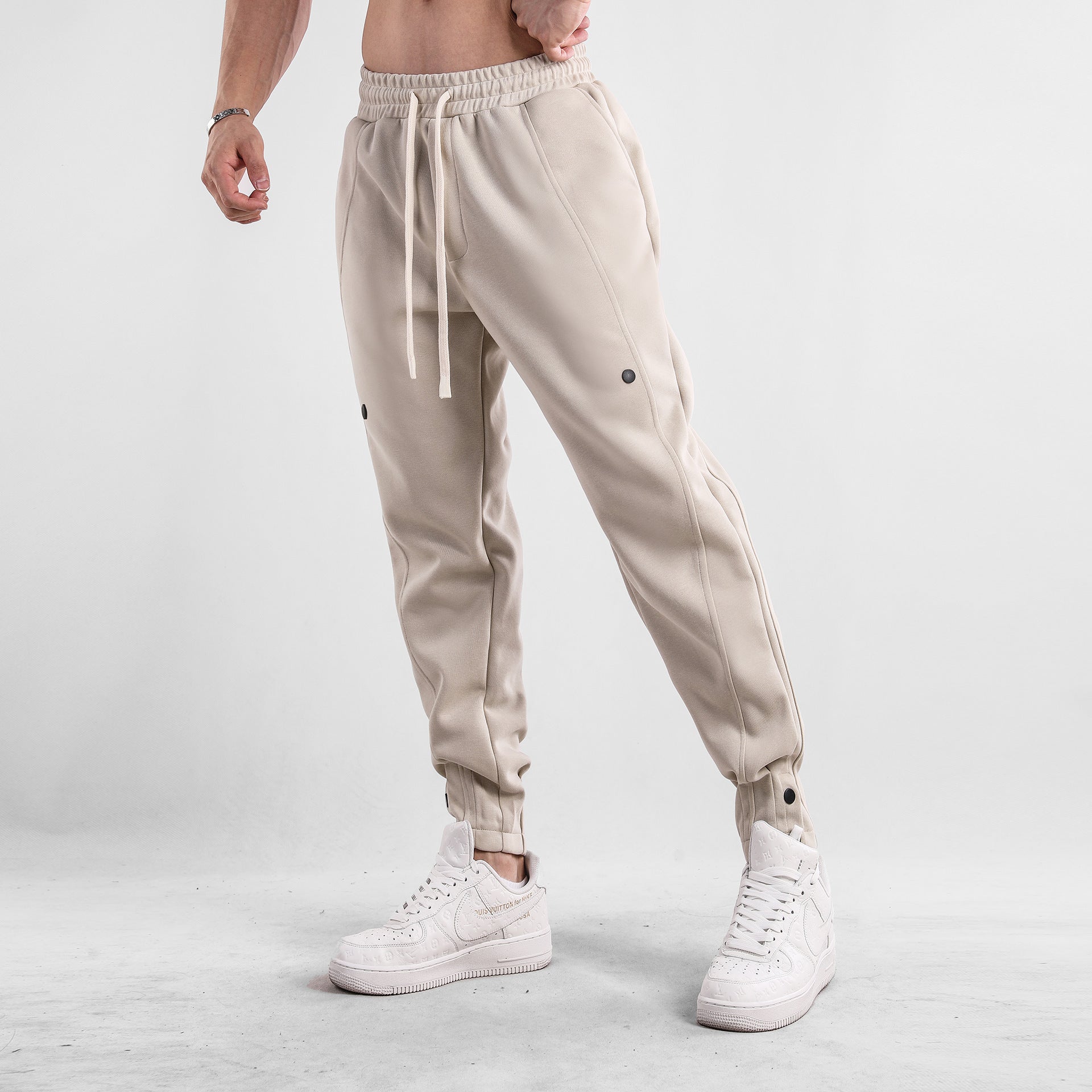 AERON™ | Pantalones casuales de hombre con cordón y pernera cónica Tech