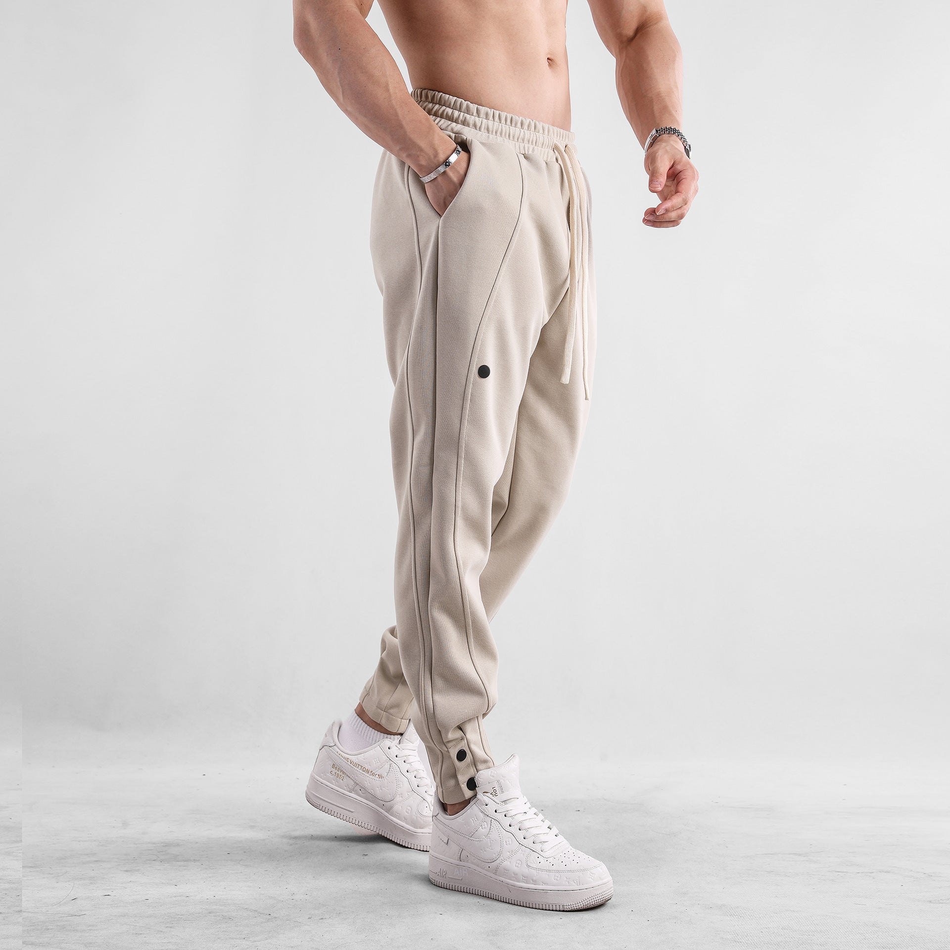 AERON™ | Pantalones casuales de hombre con cordón y pernera cónica Tech