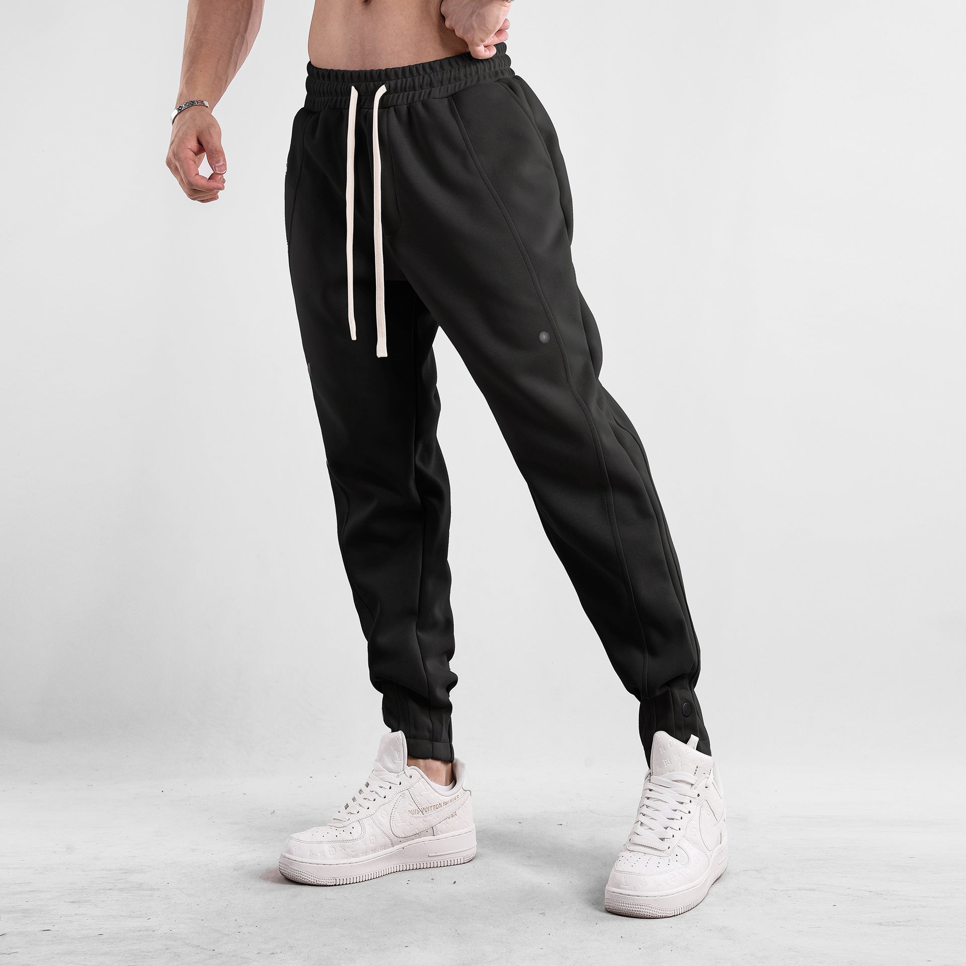 AERON™ | Pantalones casuales de hombre con cordón y pernera cónica Tech